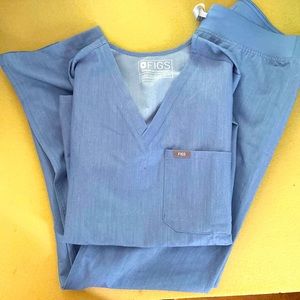 Fig scrubs size small. Never worn. Light blue.